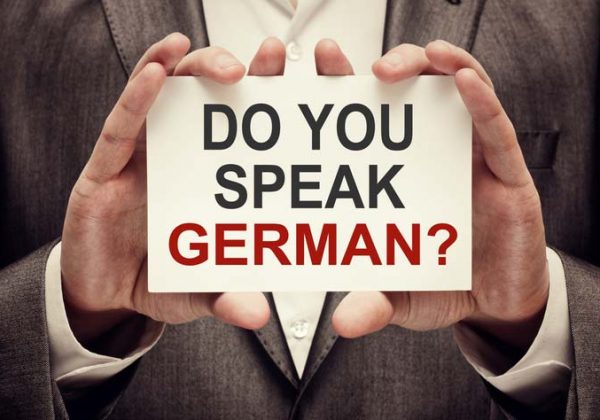 On a tablet it says "Sprechen Sie Deutsch?", Do you speak German?