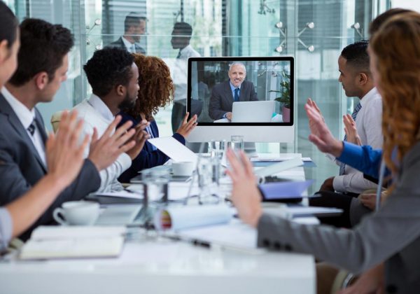 A video conference or an online group course with a teacher and a group of English students