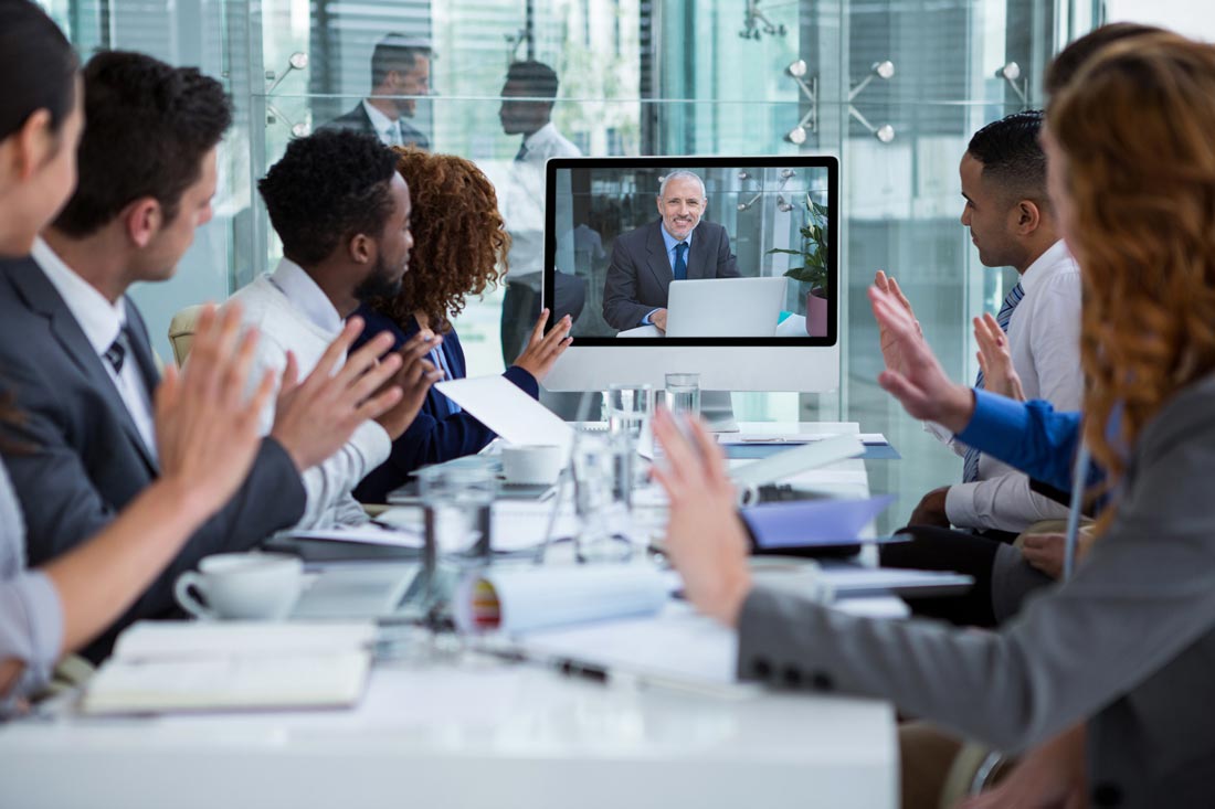 A video conference or an online group course with a teacher and a group of English students