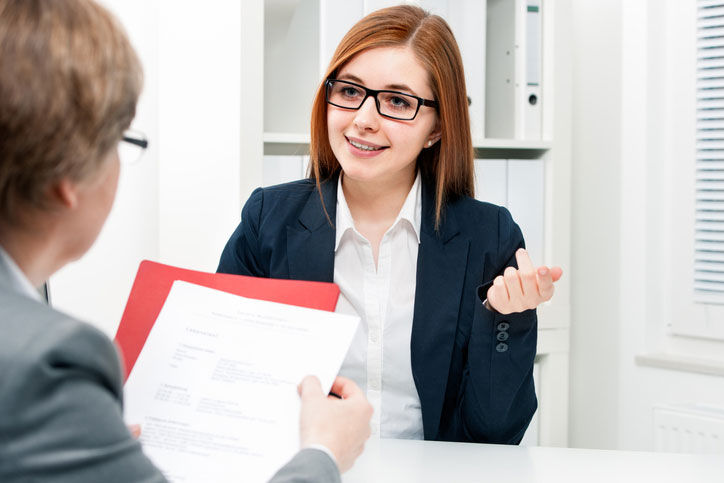 A business woman is learning French in a one-to-one tailor-made course.